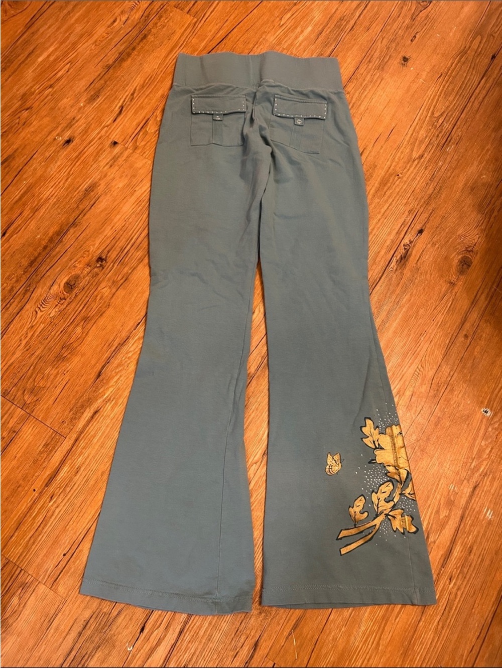 BCBGMaxAzria Teal Flared Leggings with Gold Floral Detail - Picture 2 of 6